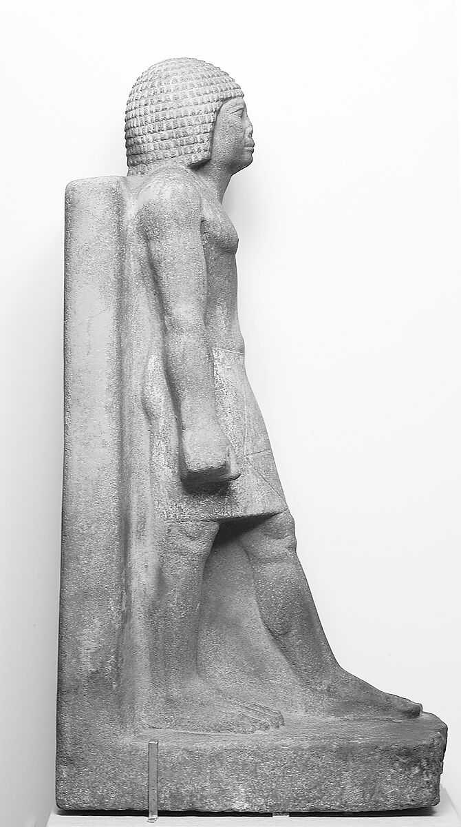 Striding Figure, Quartzite, paint