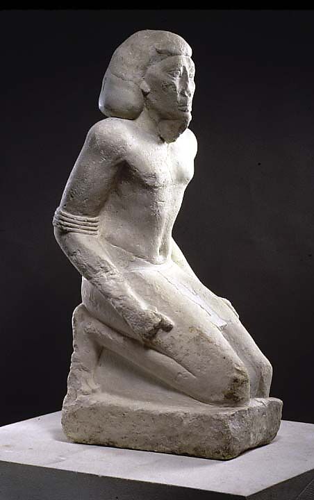 Kneeling captive, Limestone, paint