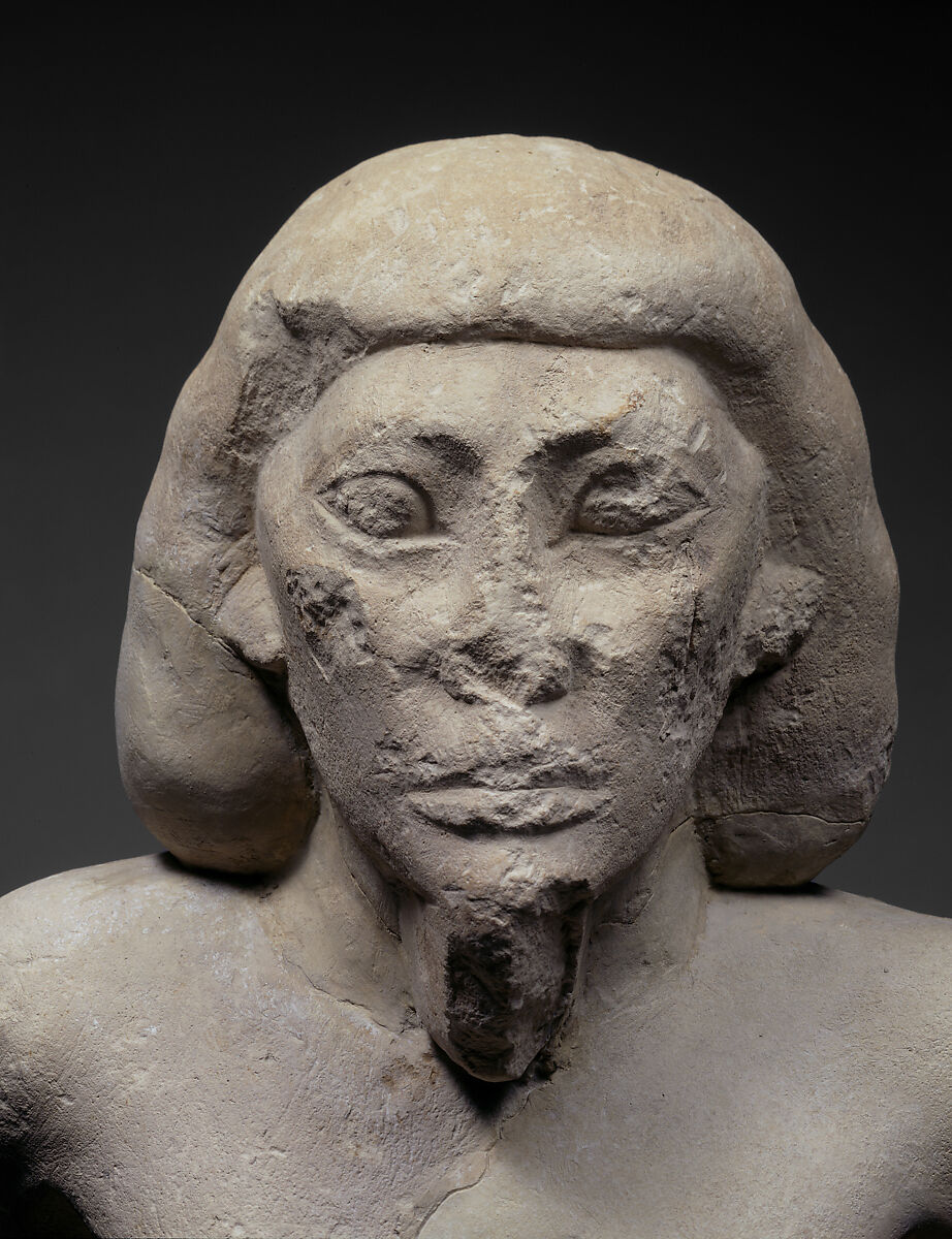 Kneeling captive, Limestone, paint