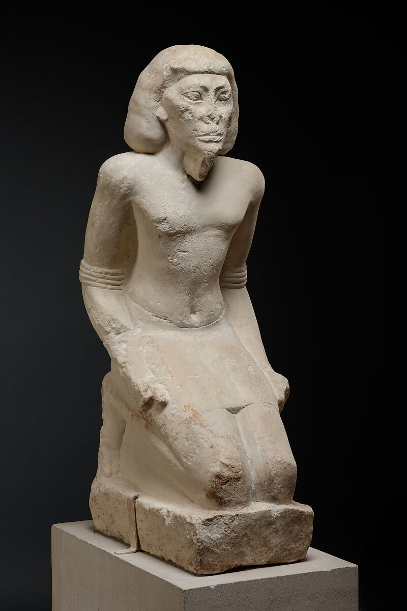 Kneeling captive, Limestone, paint
