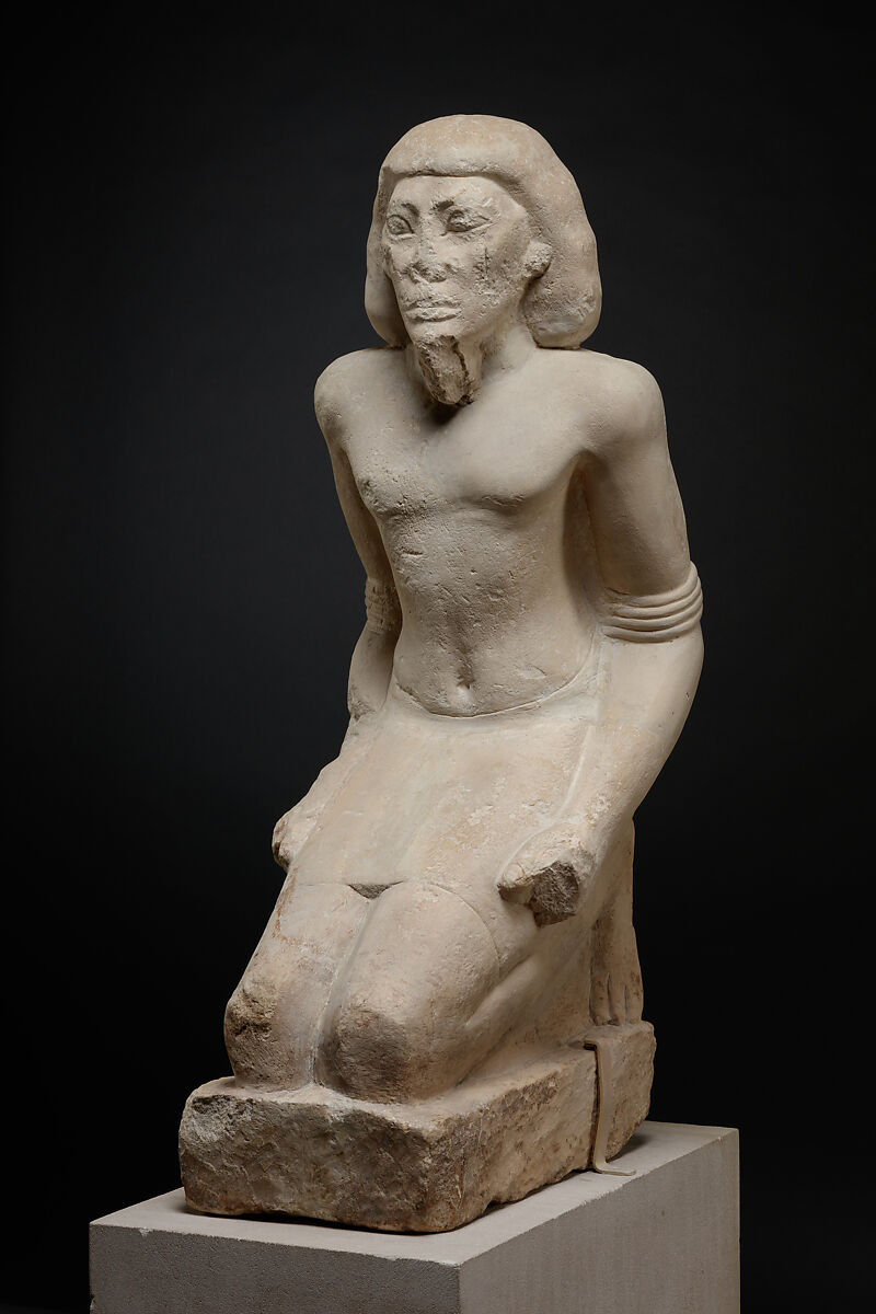 Kneeling captive, Limestone, paint