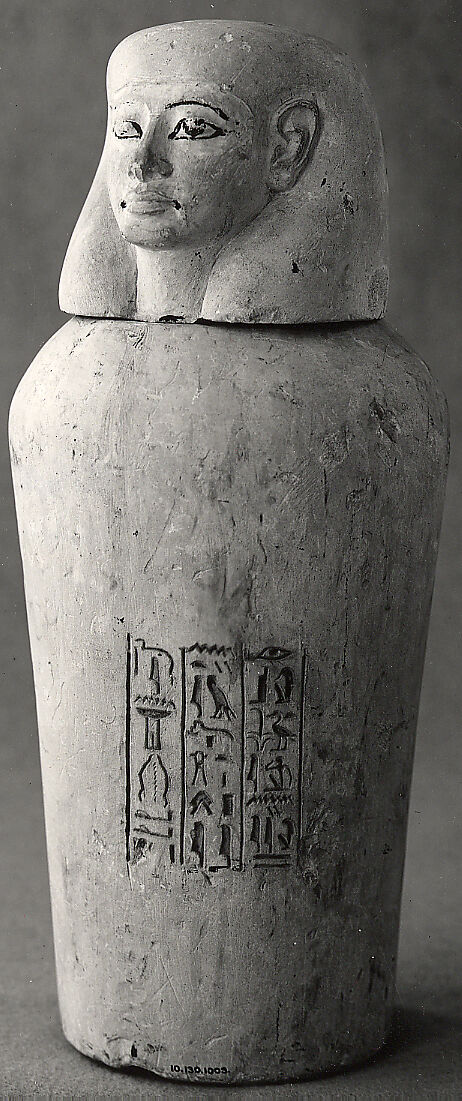 Canopic jar of princess Any, Limestone, blue paste in inscription, linen, possibly human remains 