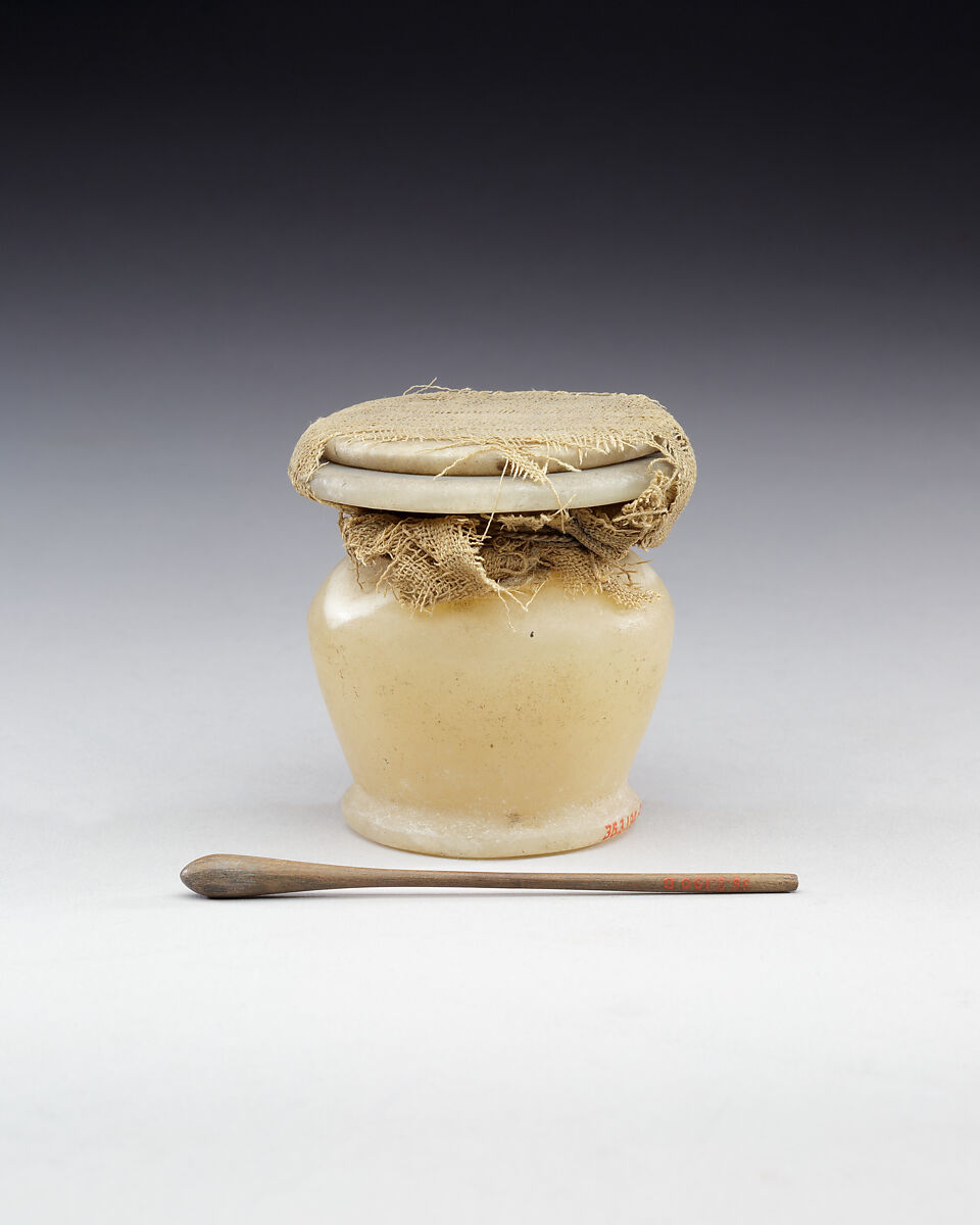 Kohl Jar with the Lid Tied in Place and Kohl Stick, Travertine (Egyptian alabaster), linen, linen cord, ebony