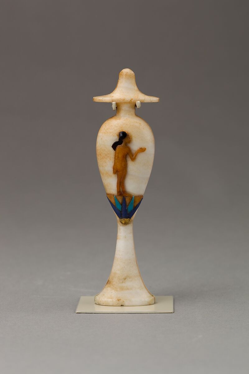 Perfume bottle in the shape of a hes-vase inlaid with the figure of a princess, Travertine (Egyptian alabaster), carnelian, obsidian,gold,  and colored glass inlay