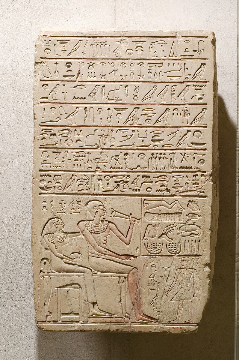 Funerary stela of "follower [of the king ?]" Megegi and his wife Henit, Limestone, paint 