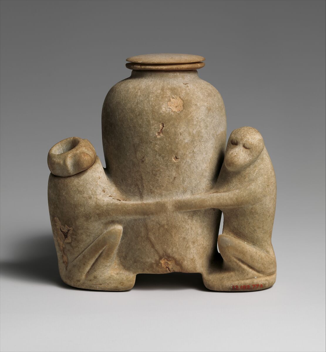 Ointment vessel in the shape of two baboons holding a jar, Anhydrite 