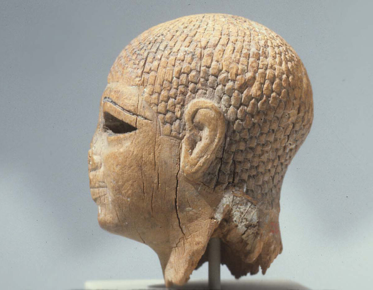Head of a Female Figure from the Tomb of Khety, Wood, paint and paste fill