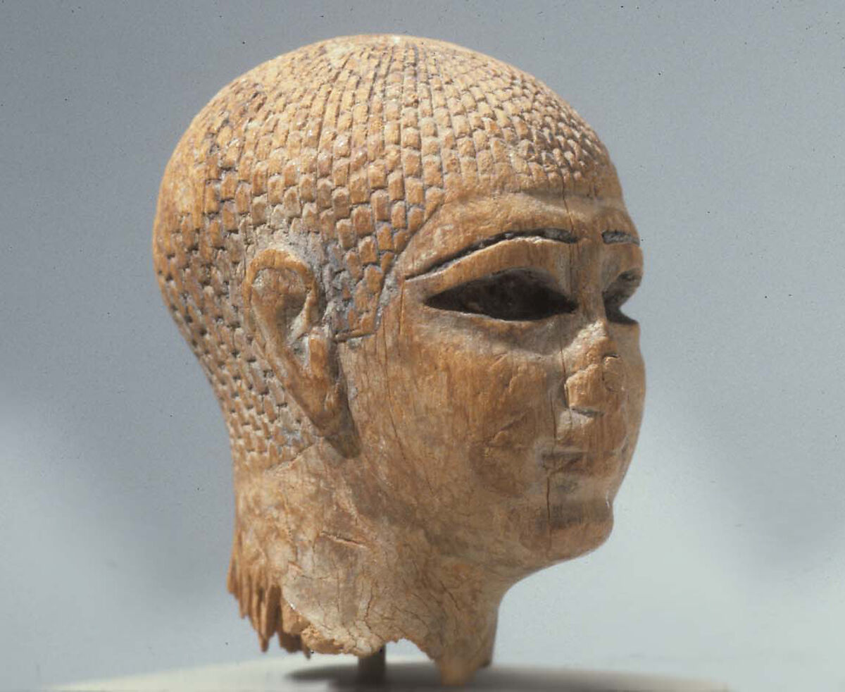 Head of a Female Figure from the Tomb of Khety, Wood, paint and paste fill
