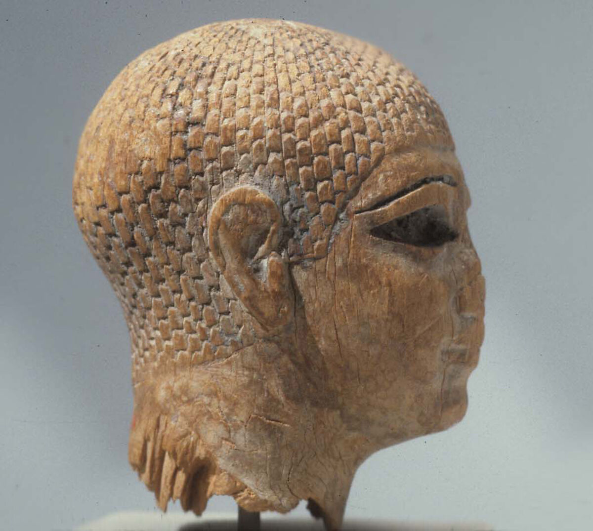 Head of a Female Figure from the Tomb of Khety, Wood, paint and paste fill