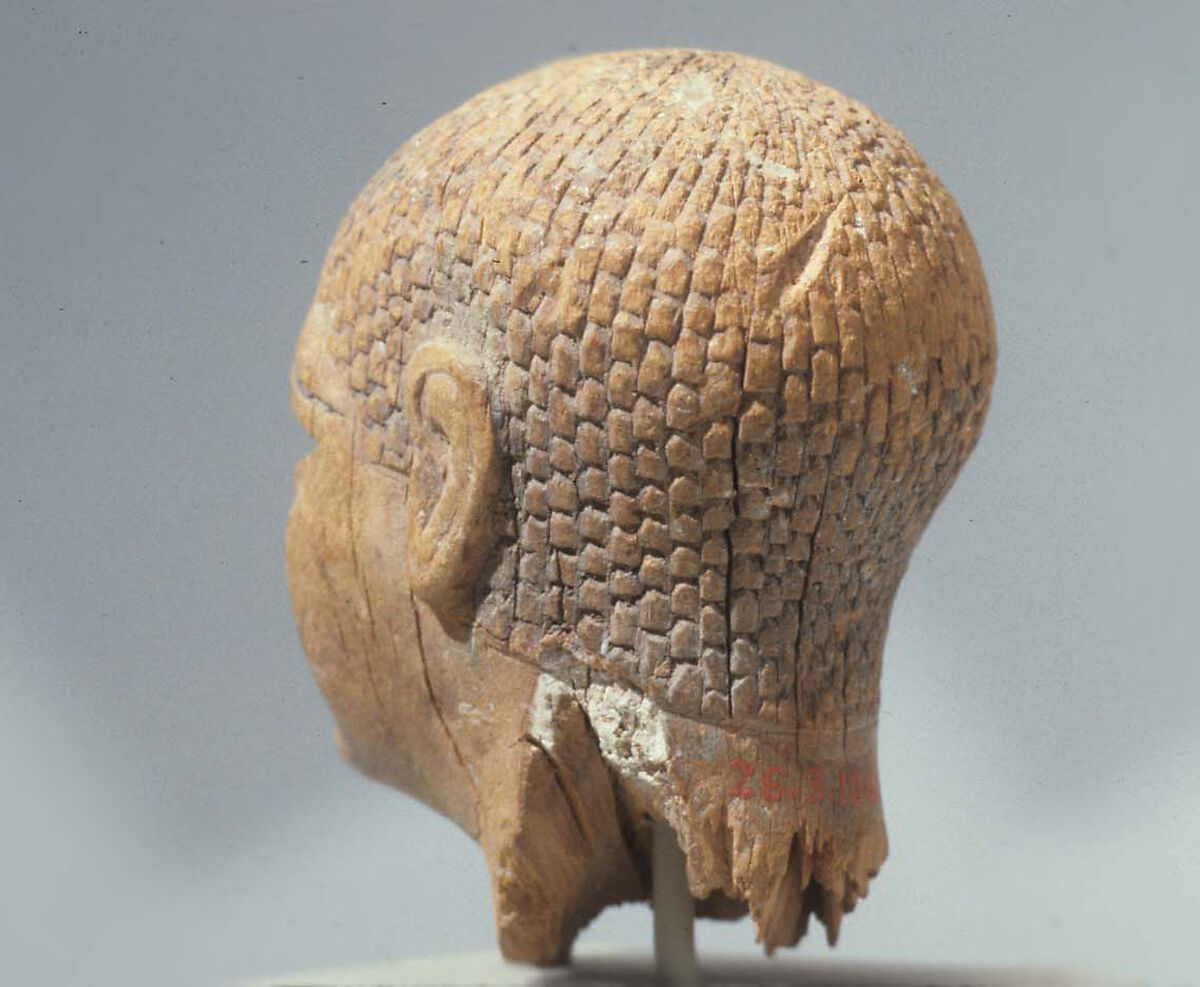 Head of a Female Figure from the Tomb of Khety, Wood, paint and paste fill