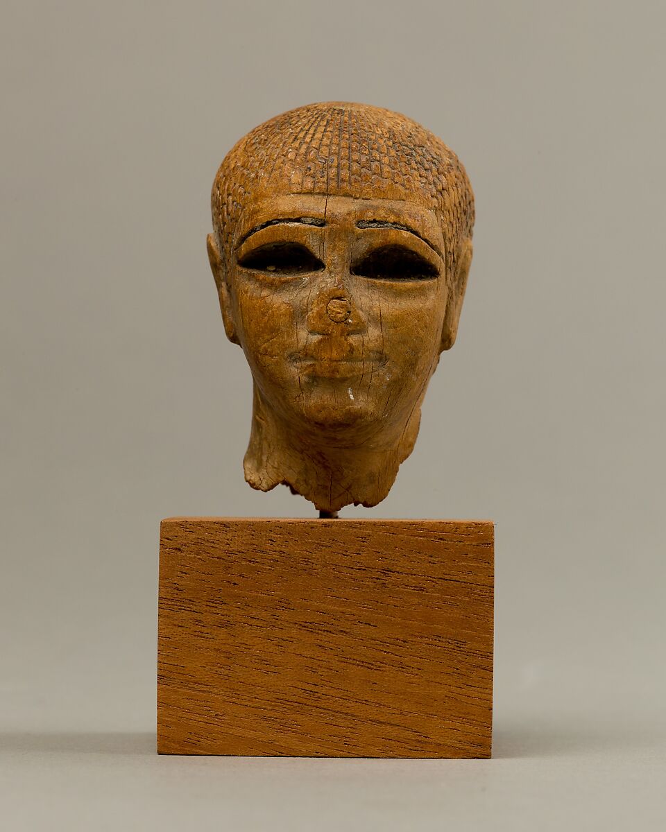 Head of a Female Figure from the Tomb of Khety, Wood, paint and paste fill