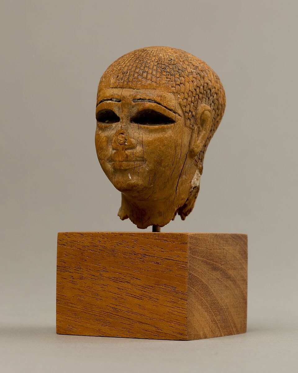 Head of a Female Figure from the Tomb of Khety, Wood, paint and paste fill