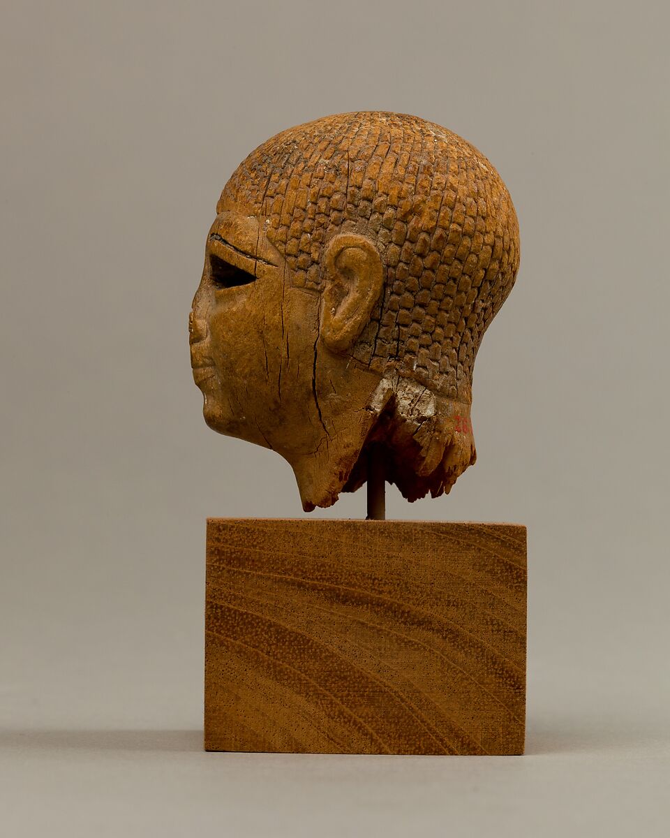 Head of a Female Figure from the Tomb of Khety, Wood, paint and paste fill