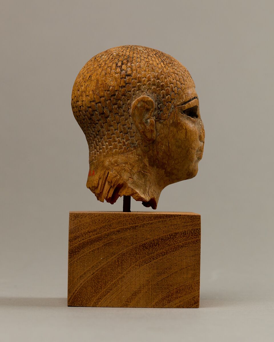 Head of a Female Figure from the Tomb of Khety, Wood, paint and paste fill