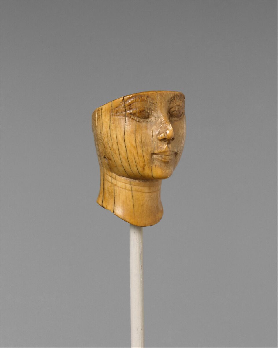 Head of a woman, Ivory (Hippopotamus), Egyptian blue (traces)