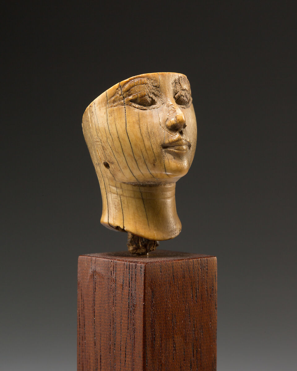 Head of a woman, Ivory (Hippopotamus), Egyptian blue (traces)