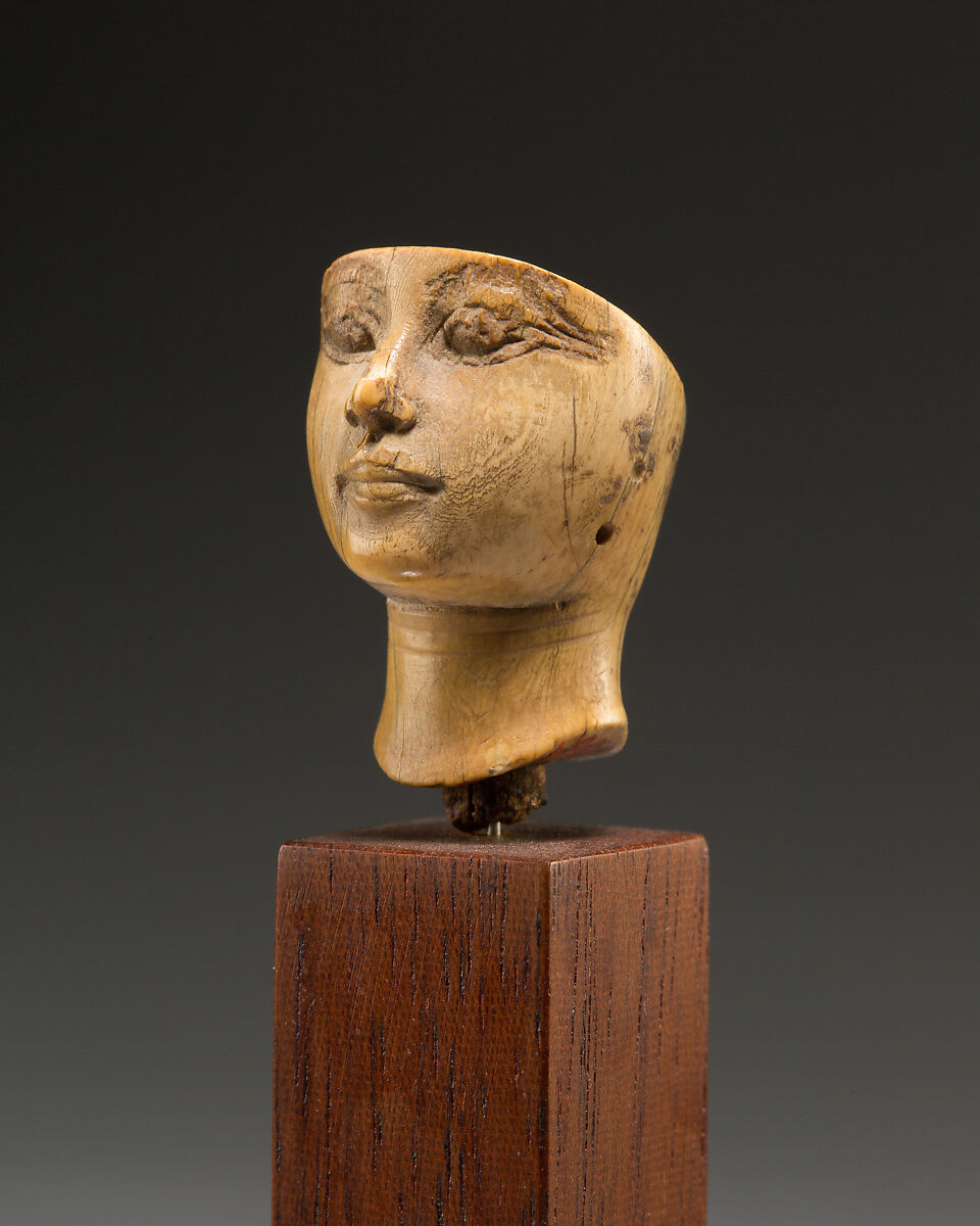Head of a woman, Ivory (Hippopotamus), Egyptian blue (traces)