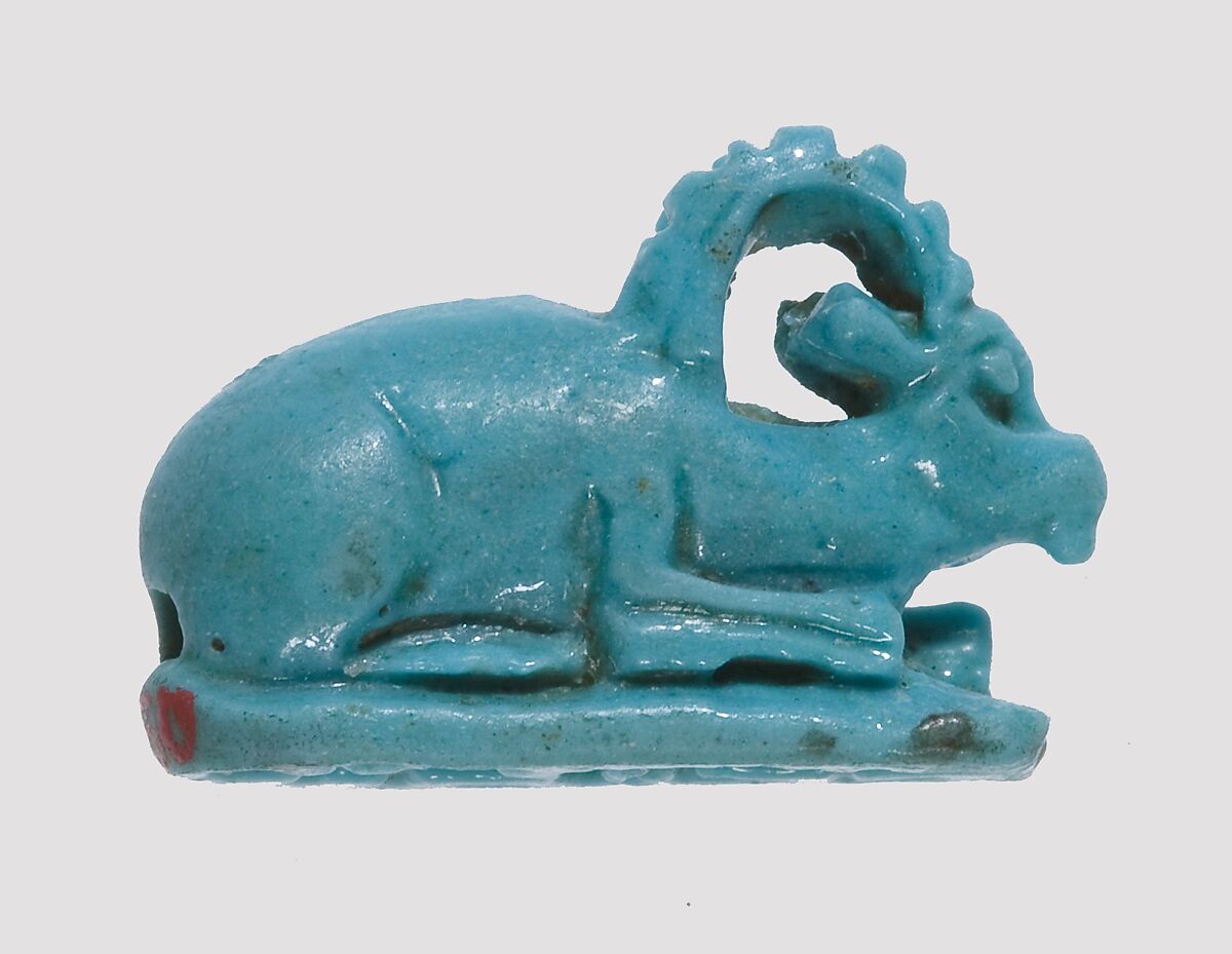 Ibex-Shaped Design Amulet Inscribed With A Crocodile and A Fish, Faience