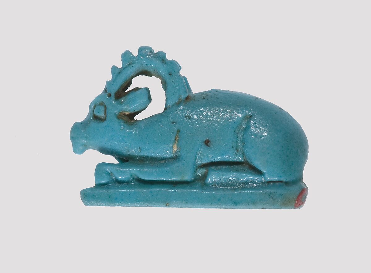 Ibex-Shaped Design Amulet Inscribed With A Crocodile and A Fish, Faience