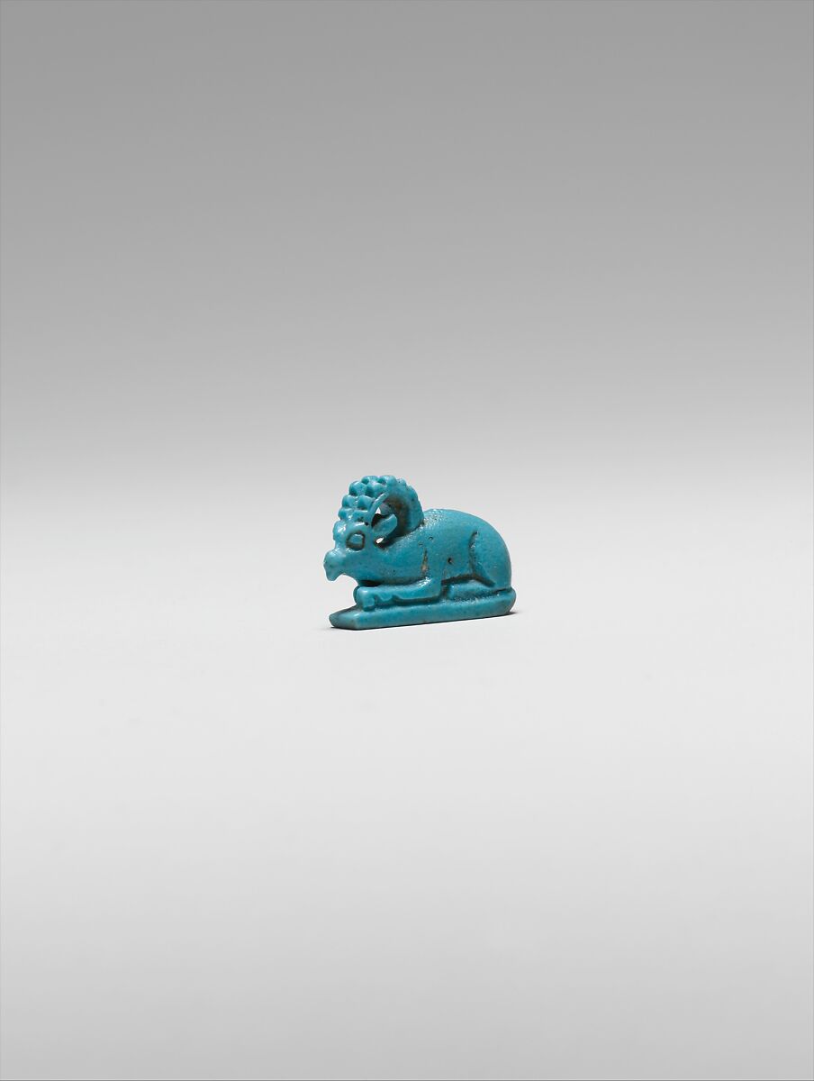 Ibex-Shaped Design Amulet Inscribed With A Crocodile and A Fish, Faience