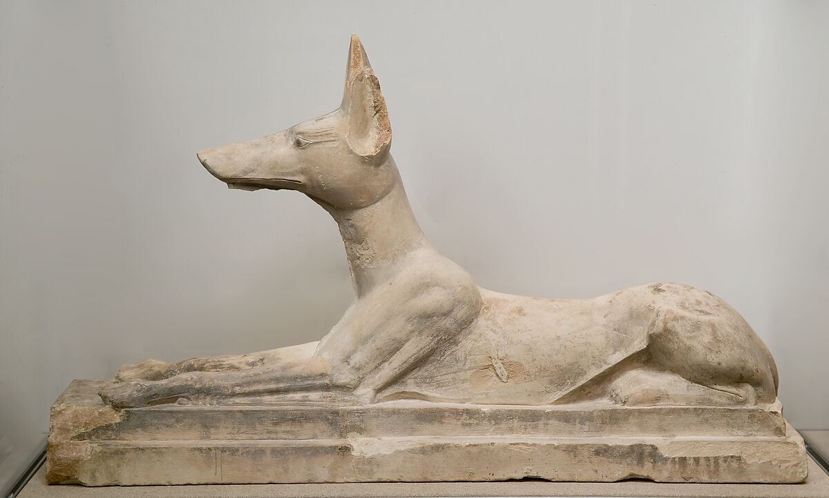 Statue of Anubis as a recumbent canid, Limestone, originally painted black