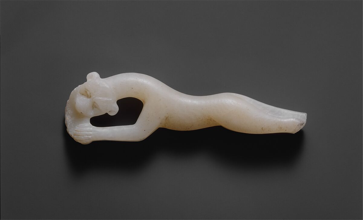 Handle of a Cosmetic Spoon in the Form of a Leopard, Travertine (Egyptian alabaster) 