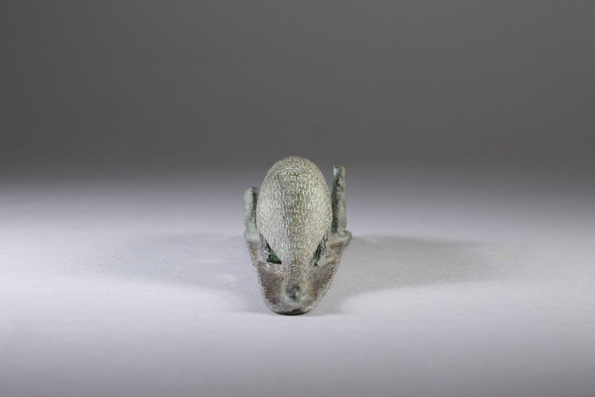 Ichneumon on a base with small cats, inscribed beneath base with the name of Padineith son of Isekhebi, Cupreous metal