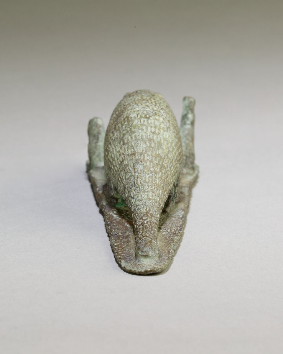 Ichneumon on a base with small cats, inscribed beneath base with the name of Padineith son of Isekhebi, Cupreous metal