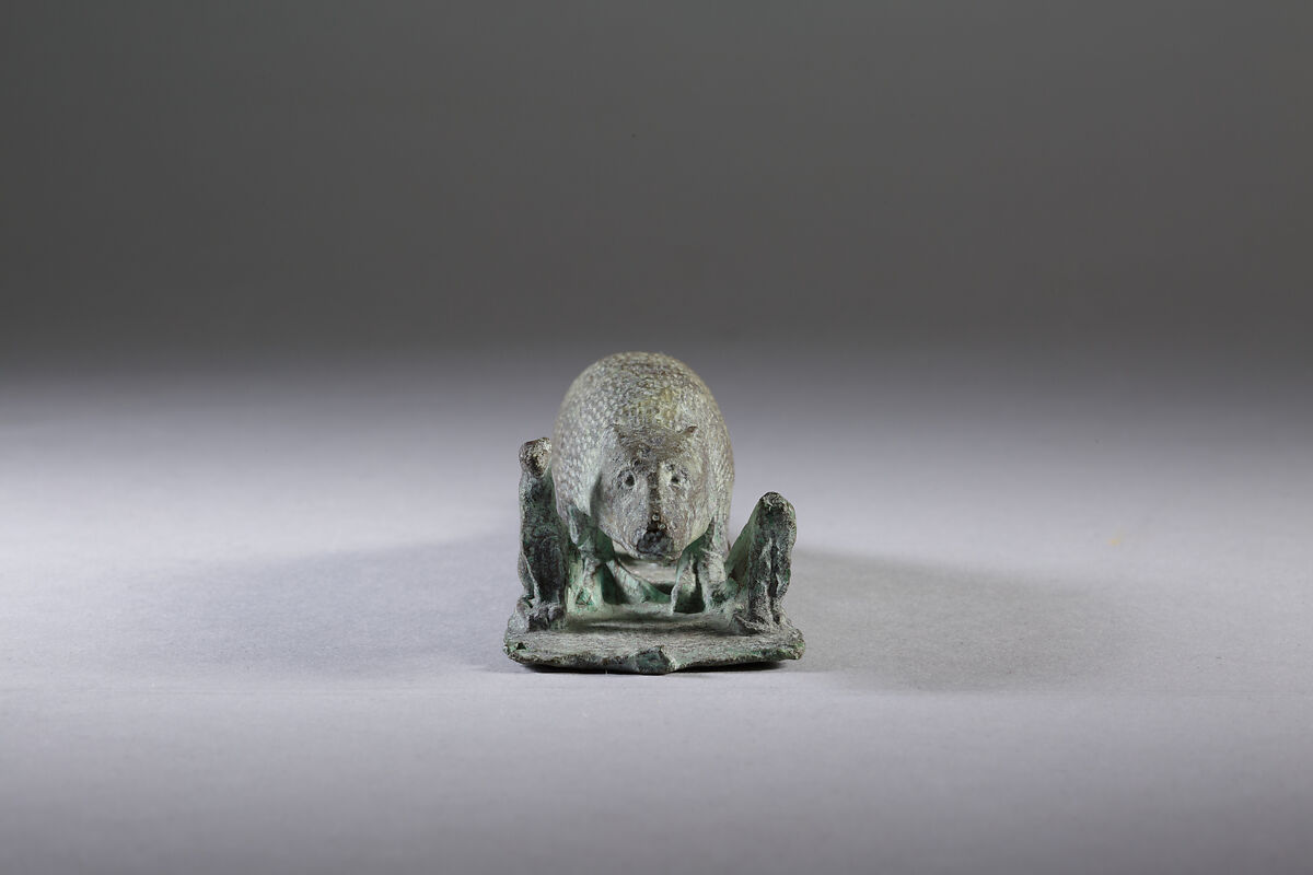 Ichneumon on a base with small cats, inscribed beneath base with the name of Padineith son of Isekhebi, Cupreous metal