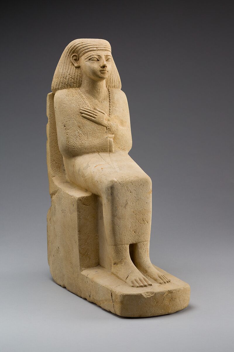 Statue of a Seated Man in a Cloak, Limestone