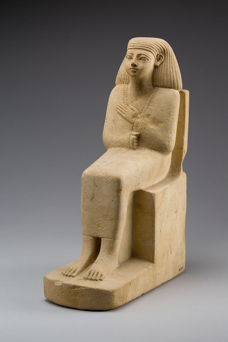 Statue of a Seated Man in a Cloak, Limestone