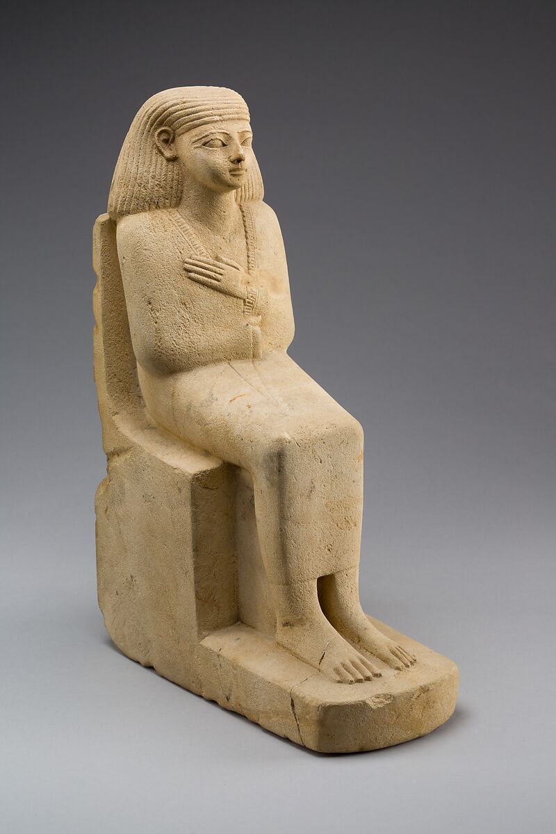 Statue of a Seated Man in a Cloak, Limestone