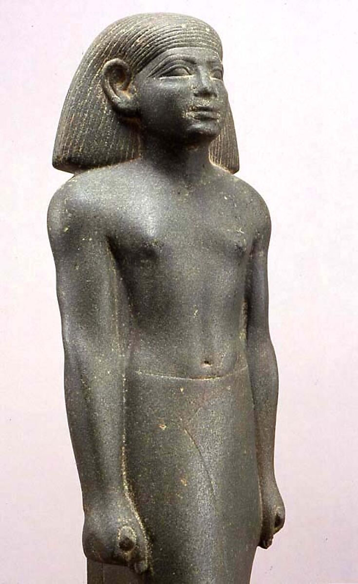 Statuette of a striding man, Greywacke