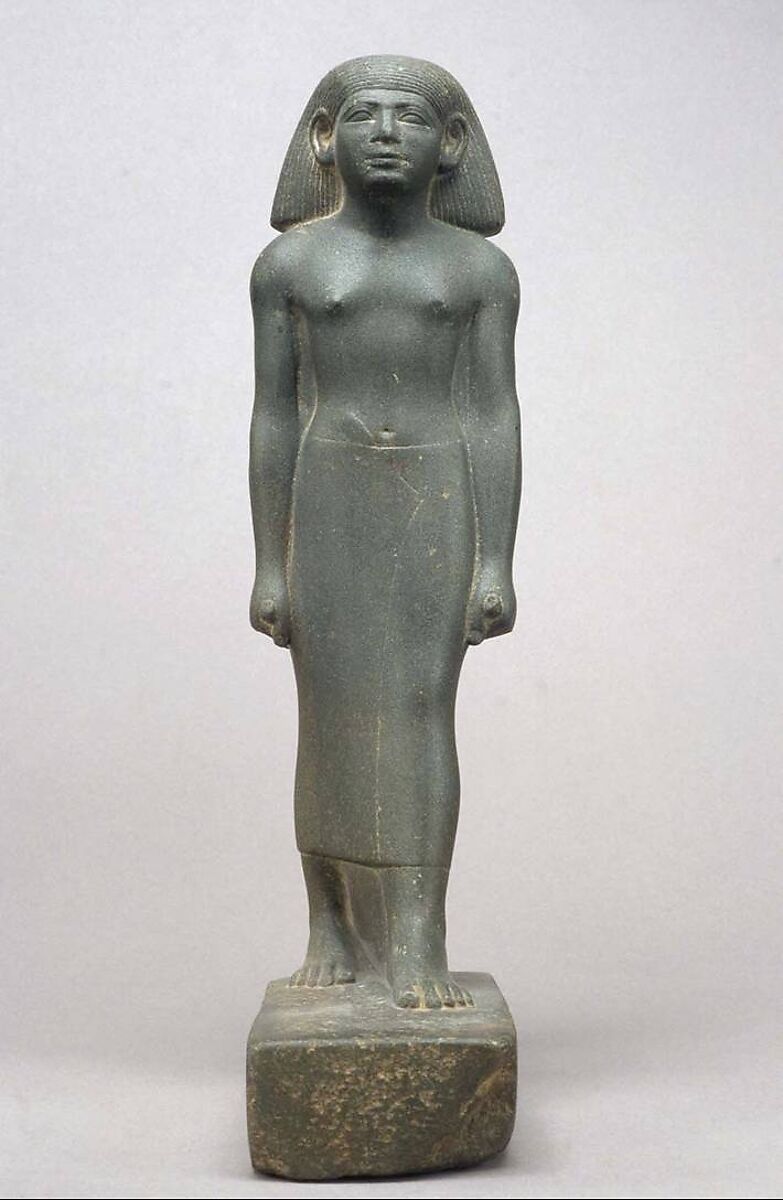 Statuette of a striding man, Greywacke