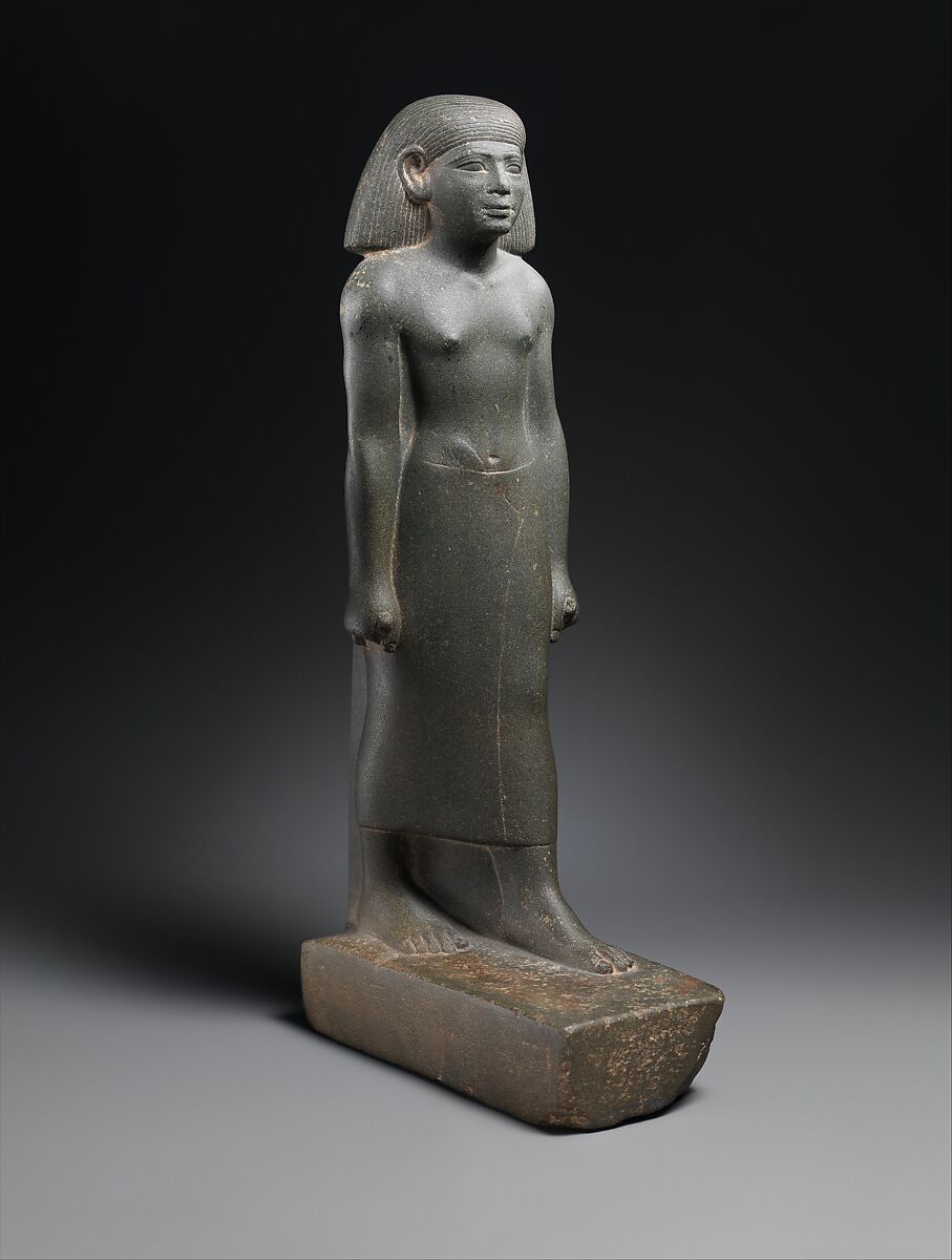 Statuette of a striding man, Greywacke