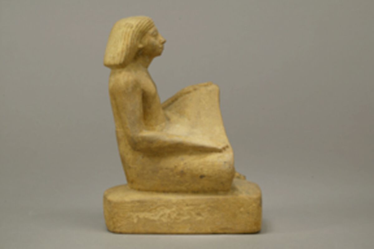 Statue of an asymmetrically seated man, Yellow limonite (G.L.Finlay)