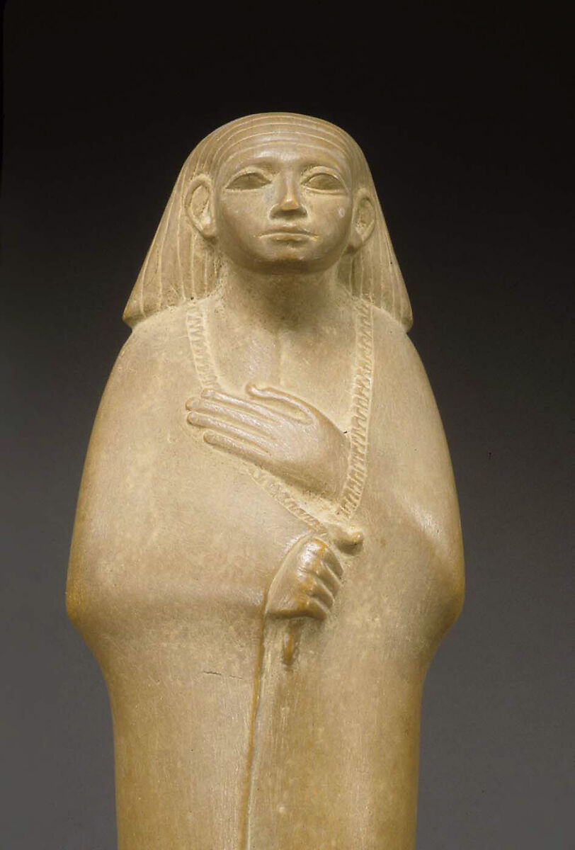 Statuette of a Cloaked Man, Yellow limestone