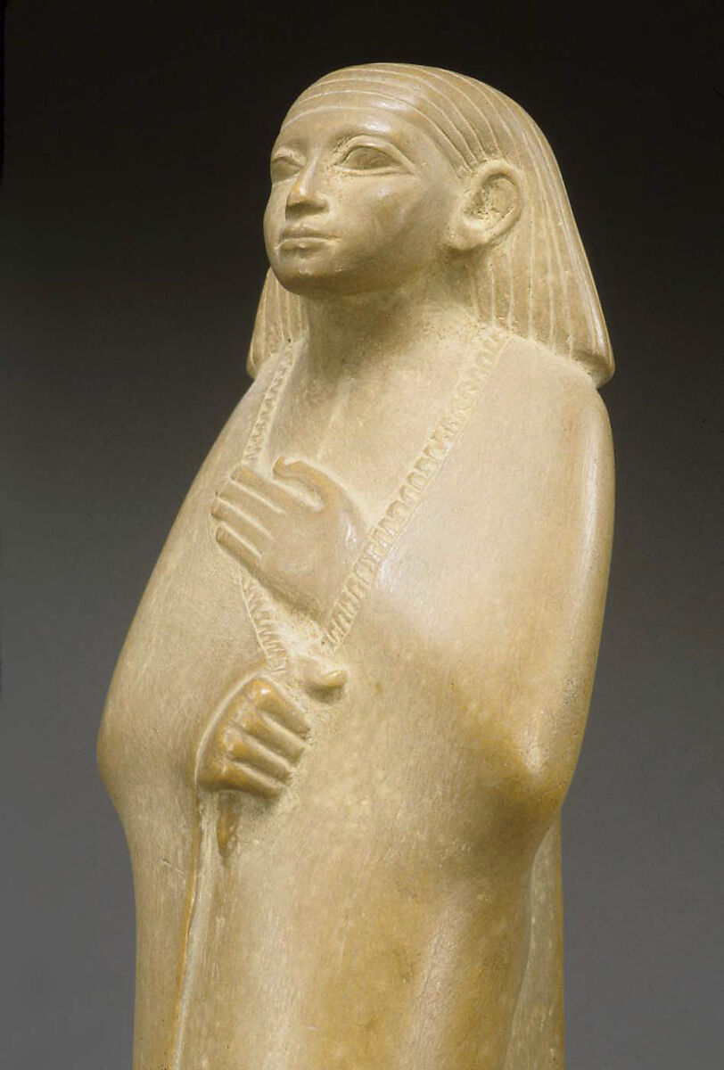 Statuette of a Cloaked Man, Yellow limestone