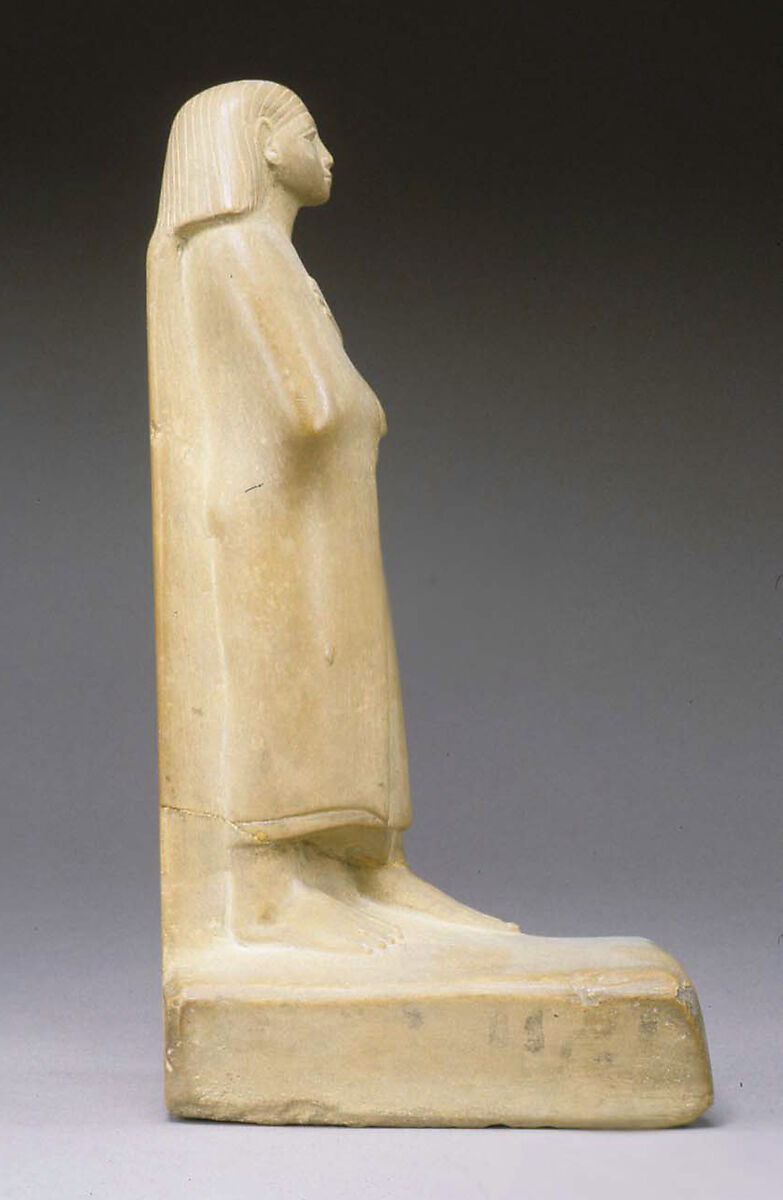 Statuette of a Cloaked Man, Yellow limestone