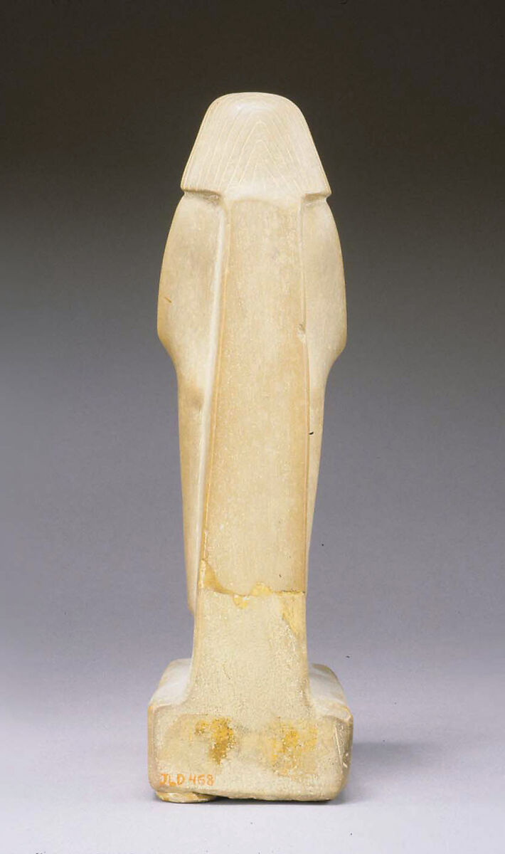 Statuette of a Cloaked Man, Yellow limestone