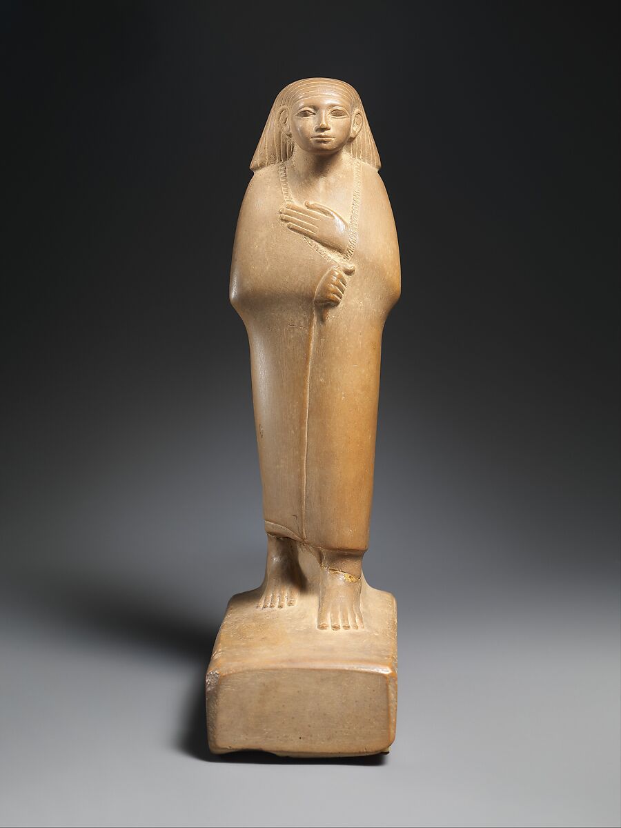 Statuette of a Cloaked Man, Yellow limestone 