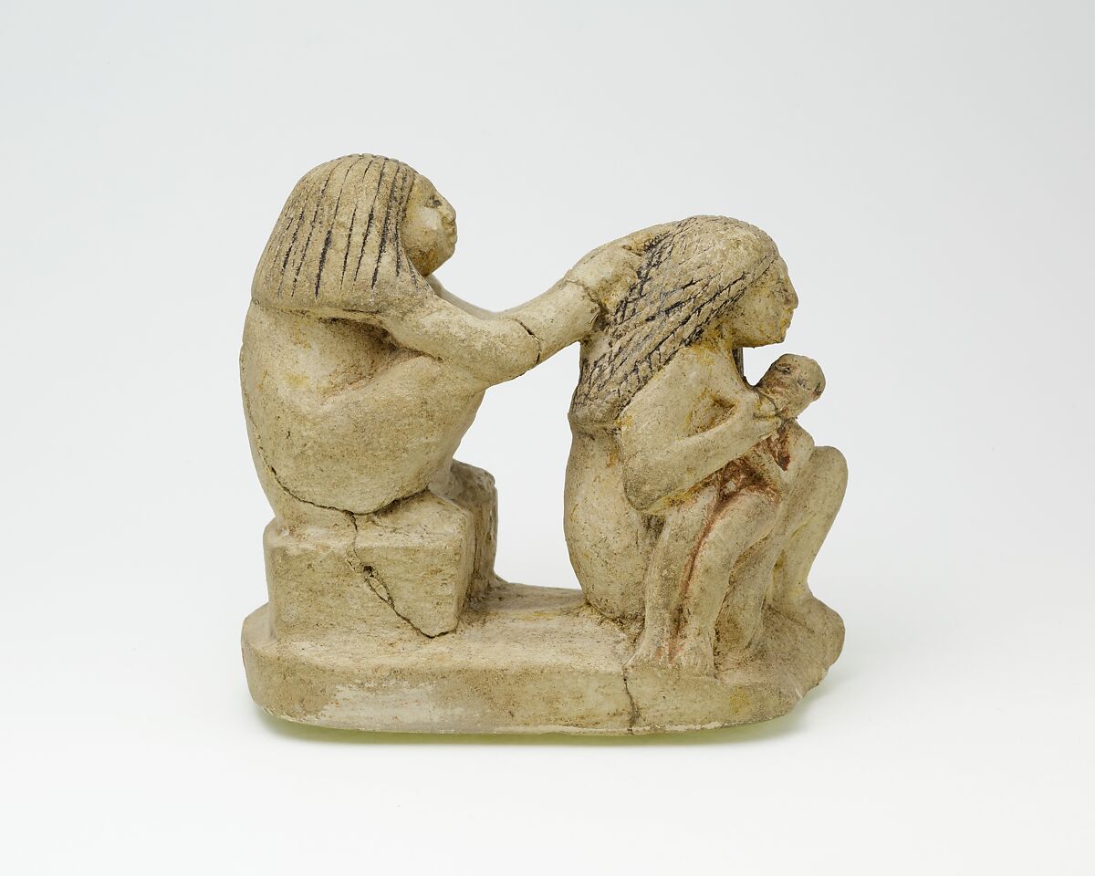 Group of two women and a child, Limestone, paint