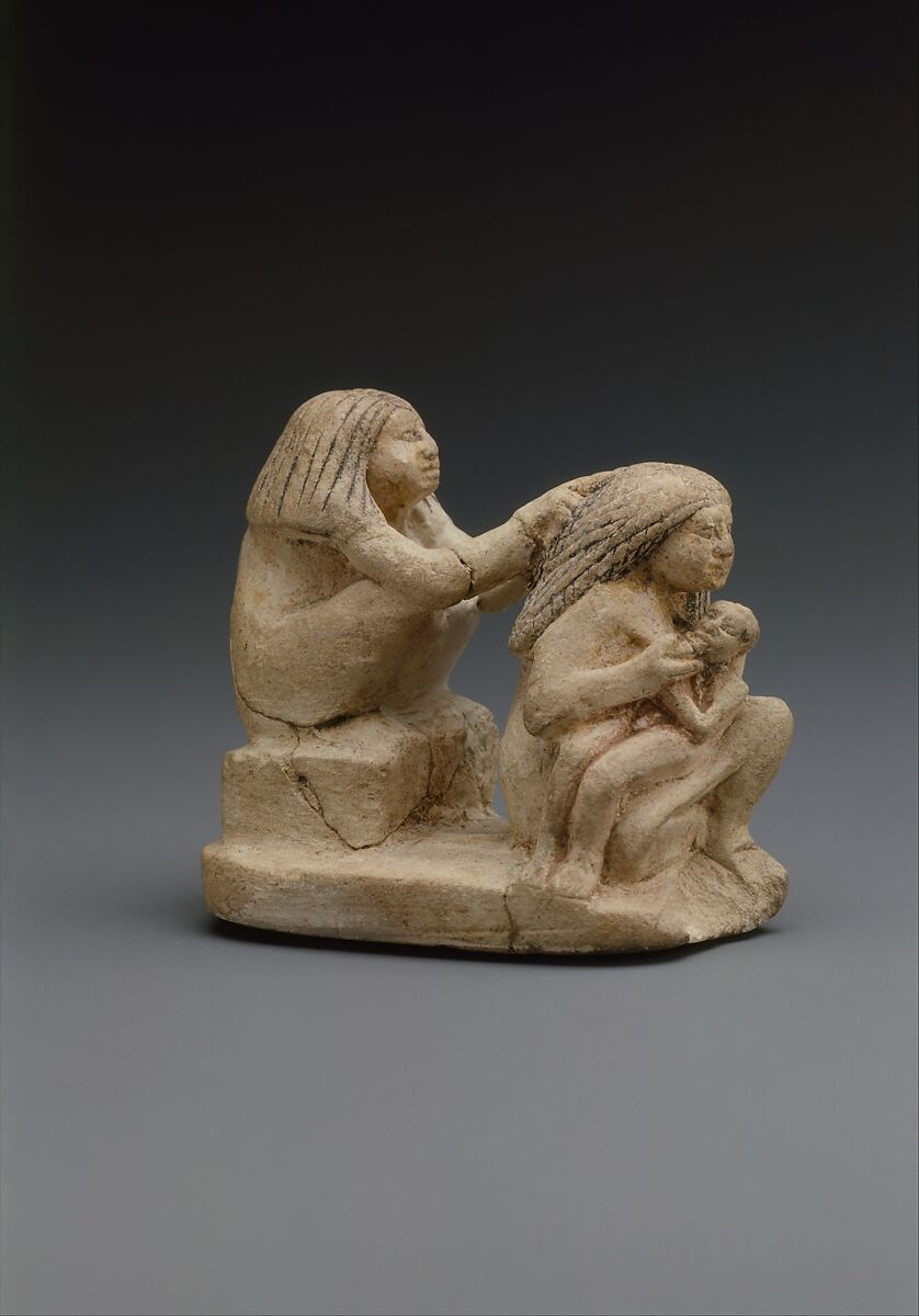 Group of two women and a child, Limestone, paint 