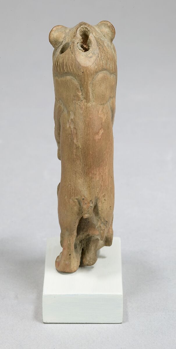 Statuette of lion holding a Nubian captive, Wood