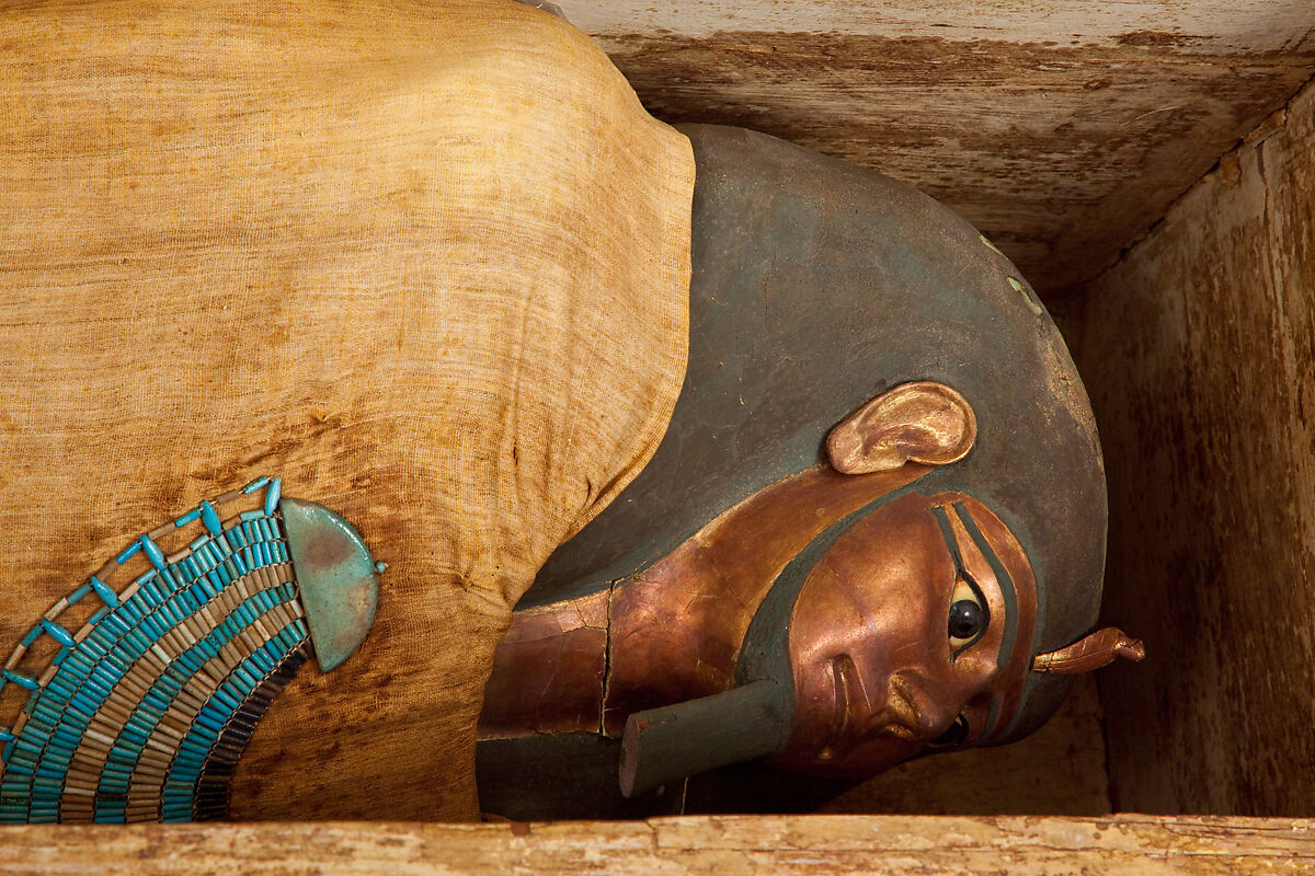 Mummy of Khnumhotep with mask and broad collar, Mummified human body, linen, mummification material, painted and gilded cartonnage, ebony, obsidian, travertine (Egyptian alabaster), faience