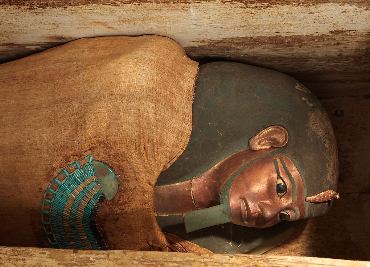 Mummy of Khnumhotep with mask and broad collar, Mummified human body, linen, mummification material, painted and gilded cartonnage, ebony, obsidian, travertine (Egyptian alabaster), faience