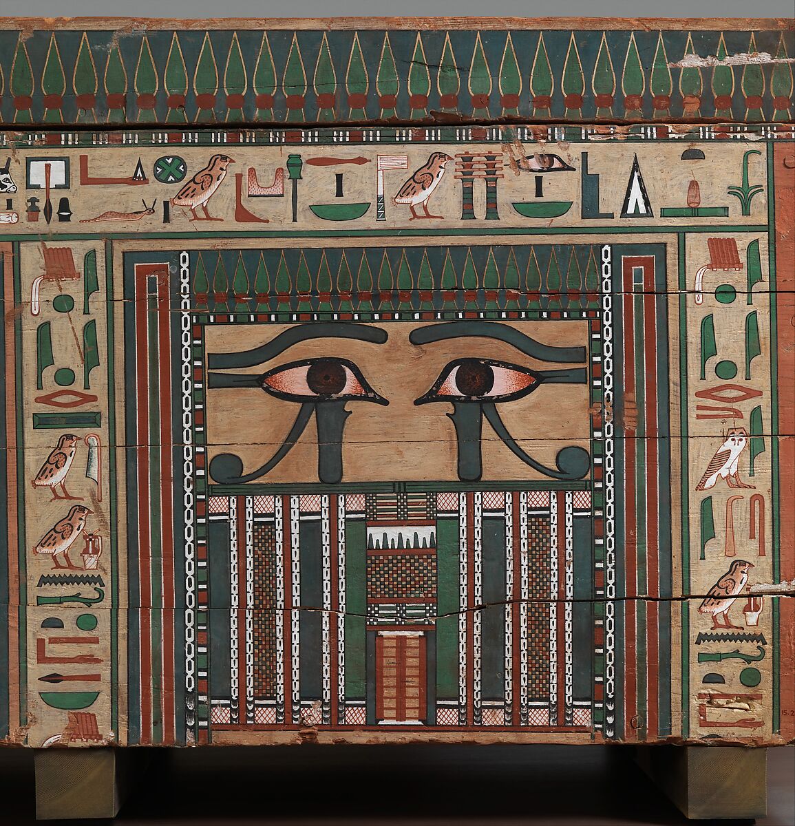 Head end and left side of the coffin.