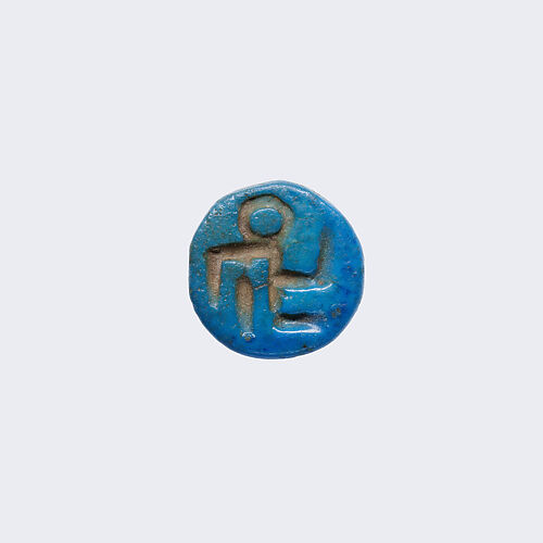 Design Amulet with Pierced Shank, Device of Squatting Child Facing Right