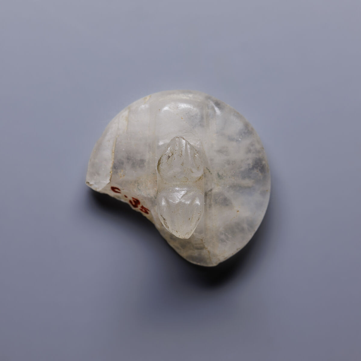 Design Amulet, a Double-Falconhead Shank Pierced Transversally on the Back, Device showing Two Hares Head-to-tail, Rock crystal