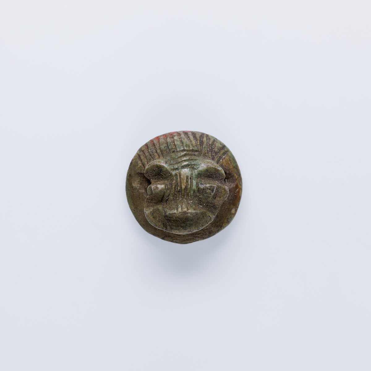 Design Amulet with a Hippopotamus (? ) Head on the Back Pierced for Stringing, and a Left-facing Monkey as the Device, Glazed steatite